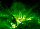 M1.8 flare and loop oscillations in AR 9373